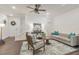 Inviting living room showcasing modern decor, hardwood floors, and natural light at 4316 Sailplane Ct, Wesley Chapel, FL 33545