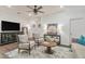 Stylish living room featuring modern decor, hardwood floors, and a comfortable seating area at 4316 Sailplane Ct, Wesley Chapel, FL 33545
