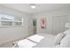 Bedroom featuring a window with blinds, closet, and natural light at 444 W Davis Blvd, Tampa, FL 33606