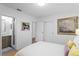 Light-filled bedroom with hardwood floors and ensuite bath access at 444 W Davis Blvd, Tampa, FL 33606
