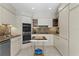 Well-equipped kitchen with modern appliances, stone countertops, and ample cabinet space for all your cooking needs at 444 W Davis Blvd, Tampa, FL 33606