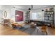 Bright, open-concept living room with hardwood floors, comfortable seating, and a stylish decor at 444 W Davis Blvd, Tampa, FL 33606