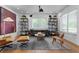 Stylish living room featuring hardwood floors, modern furnishings, and a neutral color palette at 444 W Davis Blvd, Tampa, FL 33606