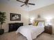Relaxing bedroom with neutral tones, overhead fan, carpet, and side tables with lamps at 4941 Bayshore Blvd, Tampa, FL 33611