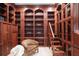 Detailed home office area with wood bookcases, cabinets, and decoratively trimmed with elegant woodwork at 4941 Bayshore Blvd, Tampa, FL 33611
