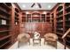 Elegant wood-paneled home office featuring extensive built-in storage and classic design details at 4941 Bayshore Blvd, Tampa, FL 33611