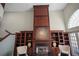 Living room showing custom built-ins around a fireplace with high ceilings at 4941 Bayshore Blvd, Tampa, FL 33611