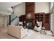 Spacious living room featuring a fireplace with custom built-ins and elegant furnishings at 4941 Bayshore Blvd, Tampa, FL 33611