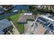 Waterfront home features a well-manicured lawn, private dock, and close proximity to neighbors at 6530 Manila Palm Way, Apollo Beach, FL 33572