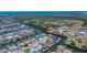 An aerial view of a waterfront community with canal access for boating at 6530 Manila Palm Way, Apollo Beach, FL 33572