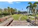 Waterfront property features lush backyard, screened-in lanai and private dock at 6530 Manila Palm Way, Apollo Beach, FL 33572