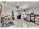 A bonus room is equipped with music equipment, tile floors, and natural light at 6530 Manila Palm Way, Apollo Beach, FL 33572