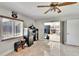 Multi-use bonus room shows a view into a living room with lots of space for activities or relaxation at 6530 Manila Palm Way, Apollo Beach, FL 33572