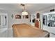 Entertainment room with pool table, artwork, and access to other rooms at 6530 Manila Palm Way, Apollo Beach, FL 33572