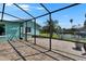 Screened patio with beautiful views, perfect for outdoor living and entertaining at 6530 Manila Palm Way, Apollo Beach, FL 33572