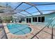 Enjoy this large screened pool area with inviting pool, perfect for summer fun and relaxation at 6530 Manila Palm Way, Apollo Beach, FL 33572