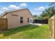 Backyard featuring a well-kept lawn, a patio, and a privacy fence at 6623 Northhaven Ct, Riverview, FL 33578