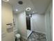 This bathroom features a tiled shower at 7102 Reindeer Rd, Tampa, FL 33619