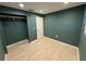 This bedroom boasts a generously sized closet with ample storage space at 7102 Reindeer Rd, Tampa, FL 33619