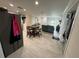 Open-concept living space, features modern tile floors and a seamless transition from kitchen to living room at 7102 Reindeer Rd, Tampa, FL 33619