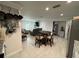Inviting home boasts an open-concept layout, seamlessly connecting the kitchen, dining, and living areas at 7102 Reindeer Rd, Tampa, FL 33619