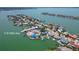 Located on a peninsula, this waterfront home offers stunning water views, boating access, and a tranquil coastal lifestyle at 719 59Th Ave, St Pete Beach, FL 33706