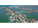 An idyllic waterfront community offering waterfront properties with boat docks and serene Gulf Coast views at 719 59Th Ave, St Pete Beach, FL 33706