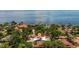 Aerial shot of estate near waterfront, highlighting proximity to the coast and lush surroundings at 7235 Sunshine S Dr, St Petersburg, FL 33705