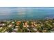 Expansive waterfront property featuring a home with a private dock and stunning bay views at 7235 Sunshine S Dr, St Petersburg, FL 33705