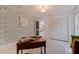 Bonus room with vibrant wallpaper, lots of storage, and natural light at 7235 Sunshine S Dr, St Petersburg, FL 33705