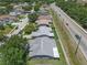 Aerial view of a community, highlighting its proximity to roadways and residential layout at 7246 Julian St, New Port Richey, FL 34653