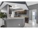 Contemporary kitchen featuring granite countertops, stainless steel appliances, and stylish cabinetry at 7246 Julian St, New Port Richey, FL 34653