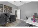 Functional home office with ample desk space, natural light, and neutral decor, perfect for work or study at 7246 Julian St, New Port Richey, FL 34653