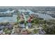 Picturesque aerial shot showcasing a lakefront home in a serene neighborhood at 728 Camrose Dr, Brandon, FL 33510