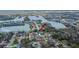 Stunning aerial view of a waterfront property nestled in a peaceful community at 728 Camrose Dr, Brandon, FL 33510
