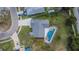Aerial view of a home with screened pool, landscaped yard, and spacious layout at 728 Camrose Dr, Brandon, FL 33510