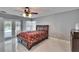 Cozy bedroom with tile floors, ceiling fan and access to the lanai at 728 Camrose Dr, Brandon, FL 33510