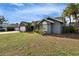 Charming single-story home with well-maintained lawn, attached garage and tropical palms in a sunny neighborhood at 728 Camrose Dr, Brandon, FL 33510