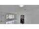 Bright living room boasting marble floors and minimalist furnishings with a sleek beverage center at 728 Camrose Dr, Brandon, FL 33510