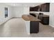 Modern kitchen with granite countertops and an island sink at 8452 Silverbell Loop, Brooksville, FL 34613