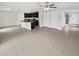 Spacious open-concept living space with tile floors and ample natural light at 8452 Silverbell Loop, Brooksville, FL 34613