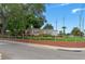 Timber Oaks community sign surrounded by landscaping, offering a welcoming entrance and established neighborhood feel at 10820 Hachita Dr, Port Richey, FL 34668