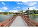 Picturesque gazebo on a pier overlooking a lake at 10820 Hachita Dr, Port Richey, FL 34668