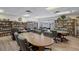 Community library with bookshelves and comfortable seating, creating a quiet space for reading and relaxation at 10820 Hachita Dr, Port Richey, FL 34668
