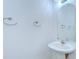 Well-lit bathroom featuring pedestal sink and ample wall space at 11304 Cayman Key Ave # 2, Tampa, FL 33624