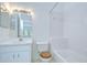 Cozy bathroom features a tiled shower/tub combination and a white vanity at 11304 Cayman Key Ave # 2, Tampa, FL 33624