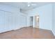 Spacious bedroom boasts a ceiling fan, a large closet and an attached bathroom at 11304 Cayman Key Ave # 2, Tampa, FL 33624