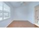 Bedroom features a window and an attached bathroom at 11304 Cayman Key Ave # 2, Tampa, FL 33624