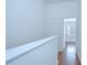Hallway view of a room with wood floor and bright window at 11304 Cayman Key Ave # 2, Tampa, FL 33624