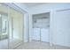 The laundry room has washer and dryer hookups with sliding door access to the patio at 11304 Cayman Key Ave # 2, Tampa, FL 33624